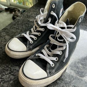 Chuck Taylor’s - mens 10/womens 12. Great condition.